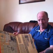 FACE TO FACE: Eric Fletcher, 60, with a scrapbook of cuttings fromhis Thatcher encounter