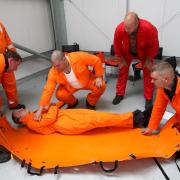 MOCK RESCUE: Deputy Business Editor Steven Hugill plays the casualty at the training centre