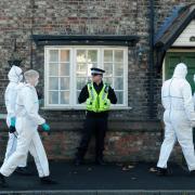 Forensic officer's at Miss Lawrence's home for the new investigation