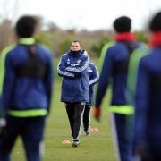 LOOKING ON: Gus Poyet watches his Sunderland side train yesterday ahead of the Capital One Cup final which takes place on Sunday