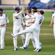 Yorkshire's Jack Brooks (centre, with head band) celebrates taking the wicket of Nottinghamshire's Alex Hales