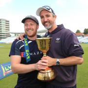 Yorkshire captain Andrew Gale shows off the County Championship trophy with coach Jason Gillespie
