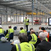 Geoff Hunton at yesterday's 'topping out' ceremony inside Hitachi's £82m Newton Aycliffe train factory. Picture by Phil Hunton.