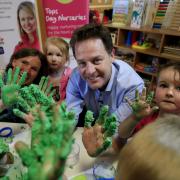 Liberal Democrat leader Nick Clegg makes play dough at a nursery in Dorset