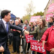 Labour Party leader Ed Miliband greets supporters as he arrives for a General Election campaign stop at the Muni Theatre in Colne, Lancashire