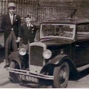 WEDDING BELLS: John in morning suit with the car