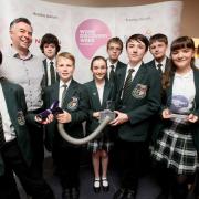 The winning members of the school's STEM (Science Technology Engineering and Maths) Club with (left) John Barnett, Operations Director of Calsonic Kansei who were the final day sponsors and (right) Michelle Brown, Senior HR Manager at Calsonic Kansei.