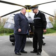 Former Chairman of the Police Authority Dave McLuckie, left, and former Chief Constable Sean Price pictured in front of Cleveland Police's helicopter