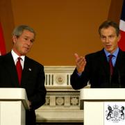 British Prime Minister Tony Blair alongside US President George Bush speaking during a joint press conference at the Foreign Office in London, November 20, 2003