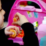 A pupil eats a packed lunch