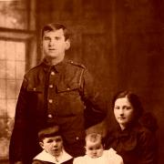 HAPPY FAMILY: Cpl Robert Pitt with his wife, Mary, and their son, Robert, and daughter, Sommena – however, Sommena was born a month after Robert was killed on the Somme 100 years ago today. He has been carefully cut out of another photo and added to a