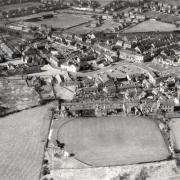 FROM THE AIR: Crook in June 1962 with the railway arcing across the top of the picture