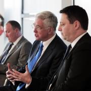 LAUNCH: Sir Michael Fallon, centre, is flanked by Tees Valley Mayor Ben Houchen, right, and Bill Scott, chief executive of Wilton Engineering, as he launches the 'Winning Locally, Going Global' report at the STEM Centre in Middlesbrough last week