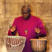 MUSICAL INTERLUDE: Dr Sentamu plays the drums during