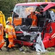 COLLISION: A coach driver was hailed a hero for his quick-thinking when a lorry overturned on the A1