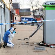 THEFT: SOCO on the scene where thieves targeted a free standing cash machine near the Heron Foods store in the Cockerton Green area of Darlington Picture: SARAH CALDECOTT