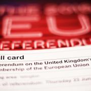 a polling card and voting guide for the 2016 EU Referendum. Picture: Yui Mok/PA Wire