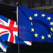 The Union and EU flags Picture: Jonathan Brady/PA