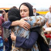 WELLINGTON, NEW ZEALAND - MARCH 17: Prime Minister Jacinda Ardern hugs a mosque-goer at the Kilbirnie Mosque on March 17, 2019 in Wellington, New Zealand. 50 people are confirmed dead and 36 are injured still in hospital following shooting attacks on two
