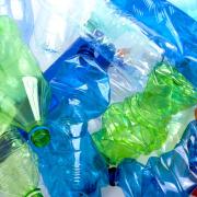 crushed multicolored plastic bottles  background.