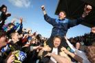 Darlington manager Martin Gray celebrates with fans at becoming champions of the Northern League