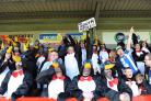 MIGRATING SOUTH: Hartlepool fans in the penguin outfits which they wore on Saturday to see their team end their days in League One with a draw at Crawley