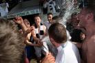 CHAMPAGNE MOMENT: Quackers celebrate Saturday's title-winning victory