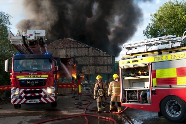 Fire crews work to put out the fire at the recycling site at Albert Hill Industrial Estate, in Darlington