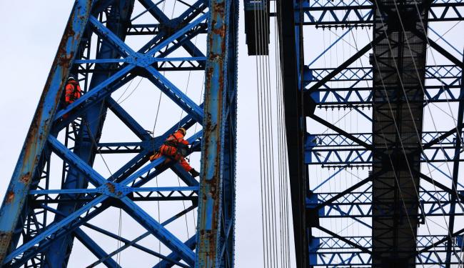 Workers prepare the Transporter Bridge in Middlesbrough for painting