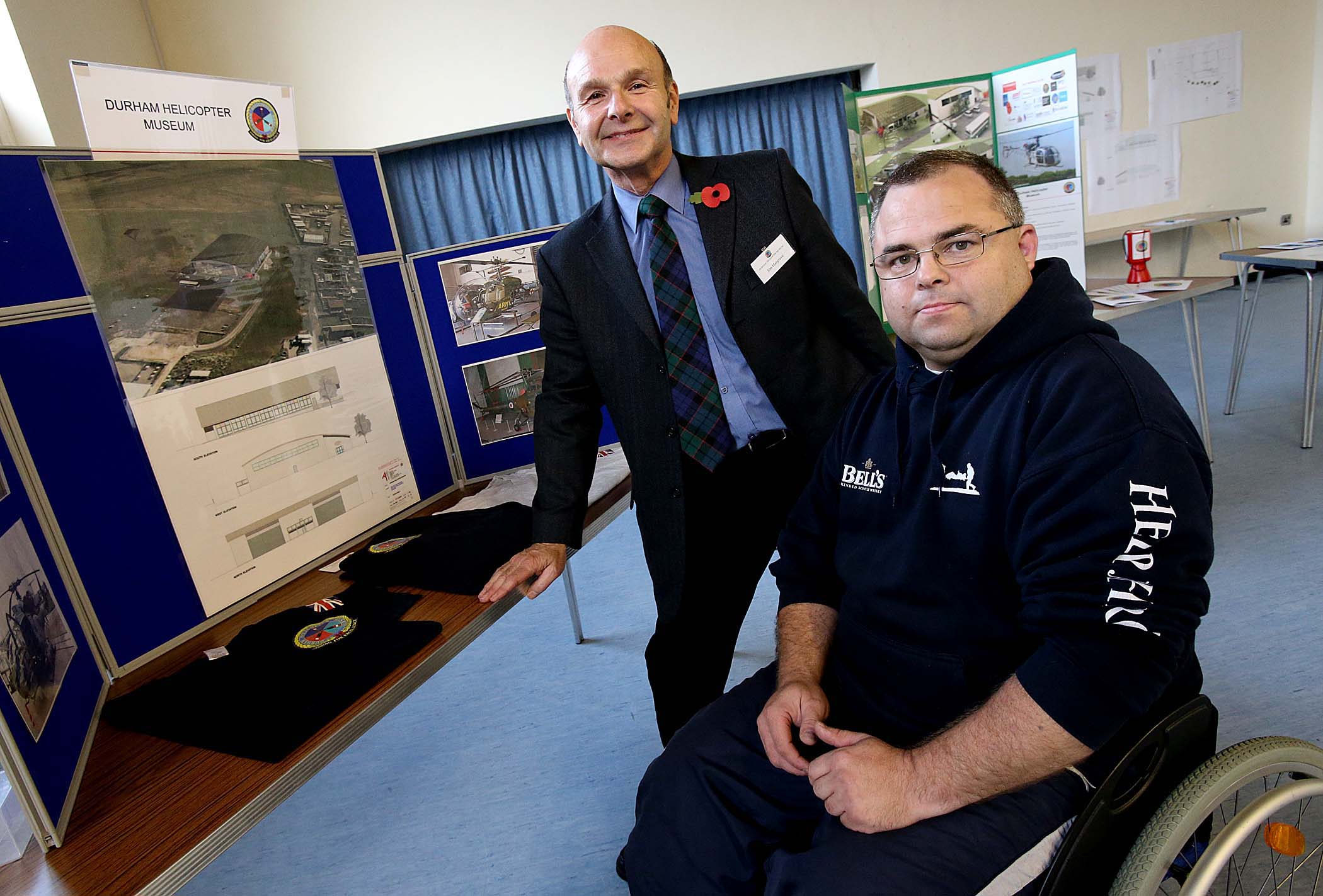 Director Duncan Moyes (front) and project development manager James Hargrave from Durham Helicopter Museum attend the event at Shotton Community Centre