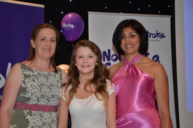 INSPIRATIONAL YOUNGSTER: Emily Simpson being presented with her award by Dr Satinder Sanghera and Emma Fitzimmons from Synergie Physiotherapy Clinic, who sponsors the award.