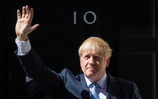 File photo dated 24/7/2019 of Boris Johnson waves outside 10 Downing Street, London. The Tories have been boosted by a "Boris bounce" after the election of their new leader, according to a poll. PRESS ASSOCIATION Photo. Issue date: Saturday