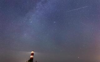 A meteor during the Perseid meteor shower seen over Happisburgh lighthouse, Norfolk. Sky gazers are set to be treated to a light display next week as Earth passes through debris left behind by a comet. Issue date: Friday August 6, 2021. Credit: PA