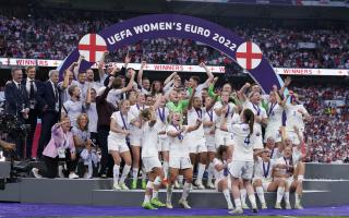 Watch the moment England team gatecrash Sarina Wegman's press conference after Euro's win (PA)