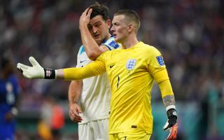 Jordan Pickford speaks with Harry Maguire during England's draw with the United States