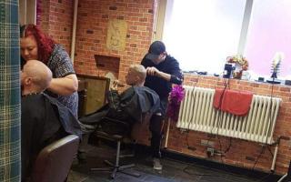 A barber is giving out free haircuts to homeless people to help build their confidence in this North East town over the Christmas period Credit: AL DEVON