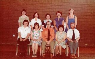 Liz Jenkins with fellow teachers. Liz is on the bottom row, second from the right.