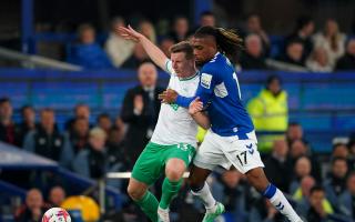 Matt Targett holds off Everton midfielder Alex Iwobi