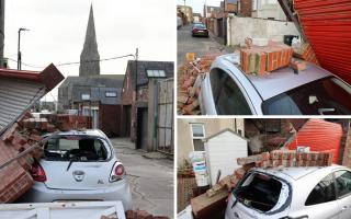 The owner of a Ford Ka had an unfortunate start to the day after their car was hit by a brick wall and a metal gate
