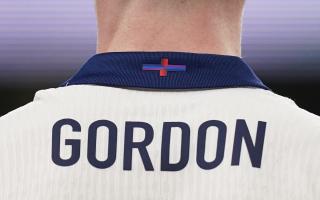 The St George's Cross detail on the back of the shirt of Newcastle United's Anthony Gordon during England's international friendly match against Brazil at Wembley