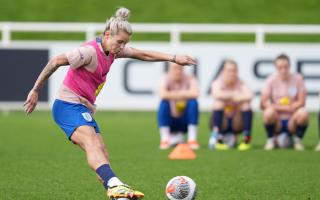 Rachel Daly fires in a shot during an England training session