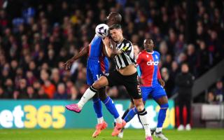 Fabian Schar challenges Jean-Philippe Mateta during Newcastle's defeat to Crystal Palace