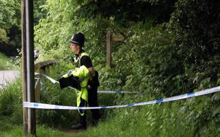 Police forensic officers gather evidence in Ovingham, Northumberland, this morning