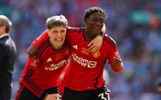 Alejandro Garnacho and Kobbie Mainoo celebrate after Manchester United's victory in the FA Cup final