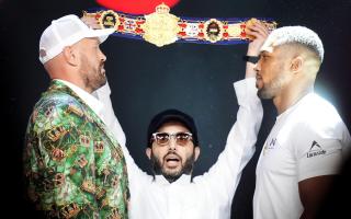 Tyson Fury (left) and Anthony Joshua exchanged in good-natured exchanges (John Walton/PA)