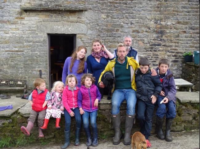 WILD: Amanda and Clive Owen with seven of their children, and Ben Fogle.