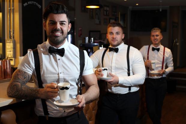 The Northern Echo: Big Brother star Anthony Hutton is adding the sale of  coffee to his bar/barber shop business in the centre of Darlington. He is pictured (front) with his head barber Ryan Watson (centre) and bar manager Junior Levi Mortimer (right). Picture: CHRIS BOOTH