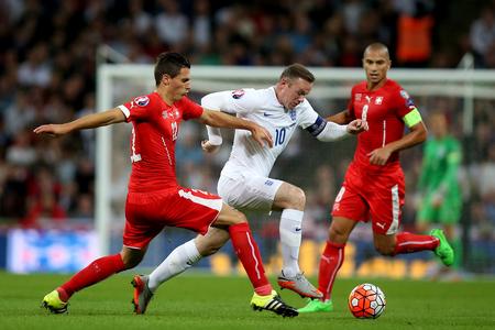 The Northern Echo: England's Wayne Rooney (centre) and Switzerland's Fabian Schar during the UEFA European Qualifying match at Wembley Stadium, London. ... Soccer - UEFA Euro 2016 - Qualifying - Group E - England v Switzerland - Wembley Stadium ... 08-09-2015 ... Lo The Northern Echo: England's Wayne Rooney (centre) and Switzerland's Fabian Schar during the UEFA European Qualifying match at Wembley Stadium, London. ... Soccer - UEFA Euro 2016 - Qualifying - Group E - England v Switzerland - Wembley Stadium ... 08-09-2015 ... Lo