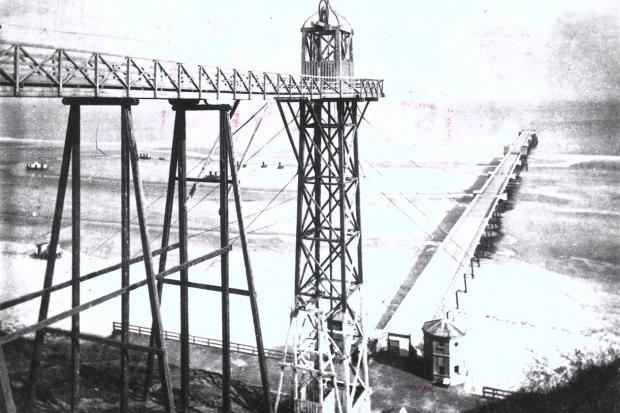 Saltburn pier and the vertical cliff hoist in 1869