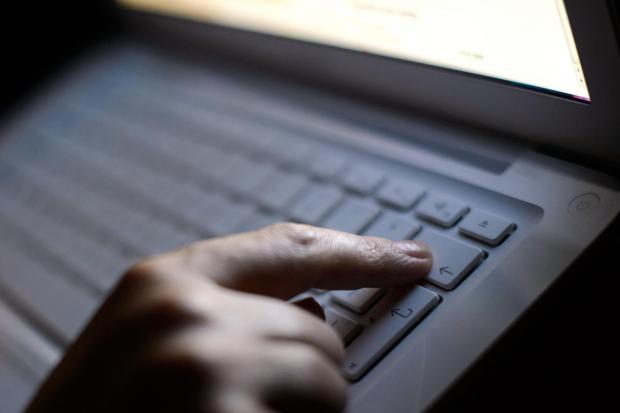 Embargoed to 0001 Wednesday September 11 File photo dated 06/08/13 of a person using a laptop. The number of grooming crimes recorded by police has risen by a third, figures suggest..
